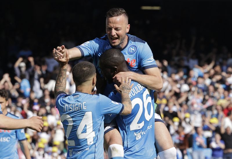 Soccer Football - Serie A - Napoli v U.S. Sassuolo - Stadio Diego Armando Maradona, Naples, Italy - April 30, 2022 Napoli's Amir Rrahmanis celebrates scoring their sixth goal with teammates