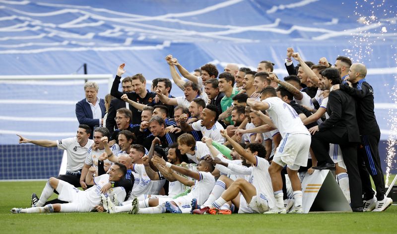 Soccer Football - LaLiga - Real Madrid v Espanyol - Santiago Bernabeu, Madrid, Spain - April 30, 2022 Real Madrid team members celebrate after winning LaLiga