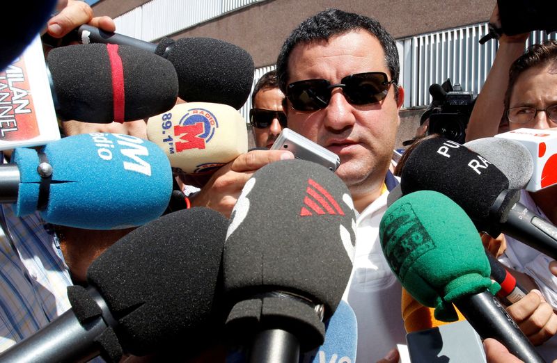 FILE PHOTO: Soccer agent Mino Raiola speaks to the media as he arrives at FC Barcelona's office in Barcelona, Spain August 26, 2010.