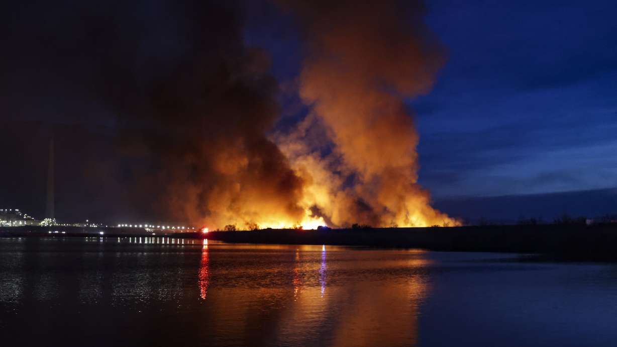 A brush fire burned near Saltair Saturday evening, causing smoke to be seen throughout the valley.