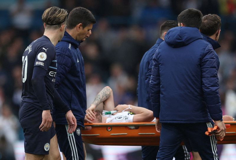 FILE PHOTO: Soccer Football - Premier League - Leeds United v Manchester City - Elland Road, Leeds, Britain - April 30, 2022 Leeds United's Stuart Dallas is stretchered off after sustaining an injury Action Images via Reuters/Carl Recine