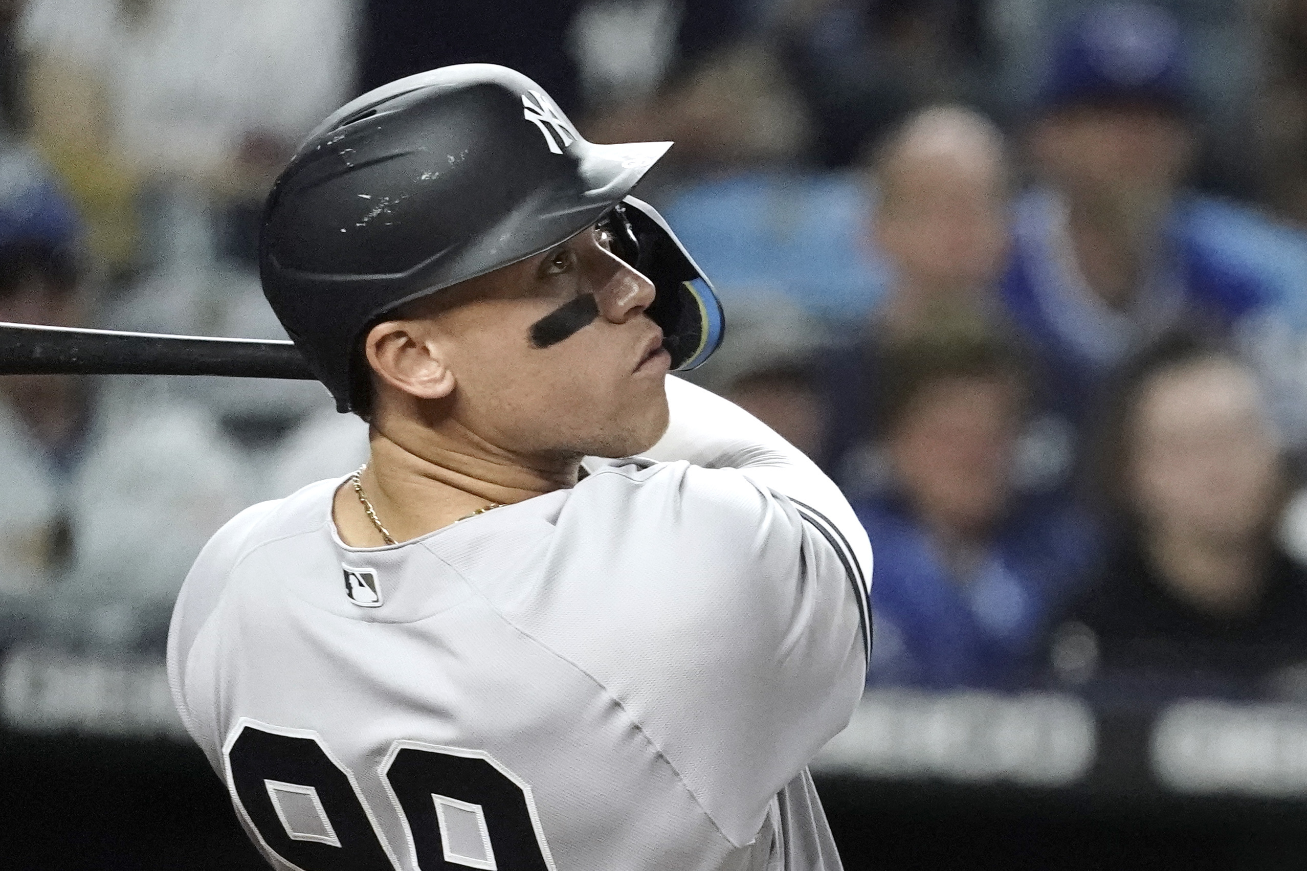 New York Yankees' Aaron Judge watches his three-run home run during the seventh inning of a baseball game against the Kansas City Royals Friday, April 29, 2022, in Kansas City, Mo. 