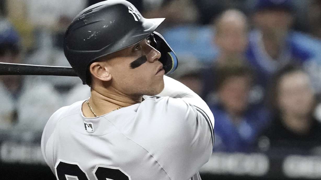 New York Yankees' Aaron Judge watches his three-run home run during the seventh inning of a baseball game against the Kansas City Royals Friday, April 29, 2022, in Kansas City, Mo.