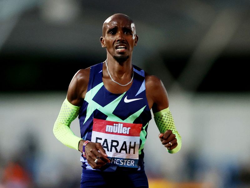 FILE PHOTO: Athletics - British Athletics Championships - Manchester Regional Arena, Manchester, Britain - June 25, 2021 Britain's Mo Farah reacts after the Men's 10,000m as he fails to qualify for the 10,000m at the Tokyo Olympics Action Images via Reuters/Molly Darlington