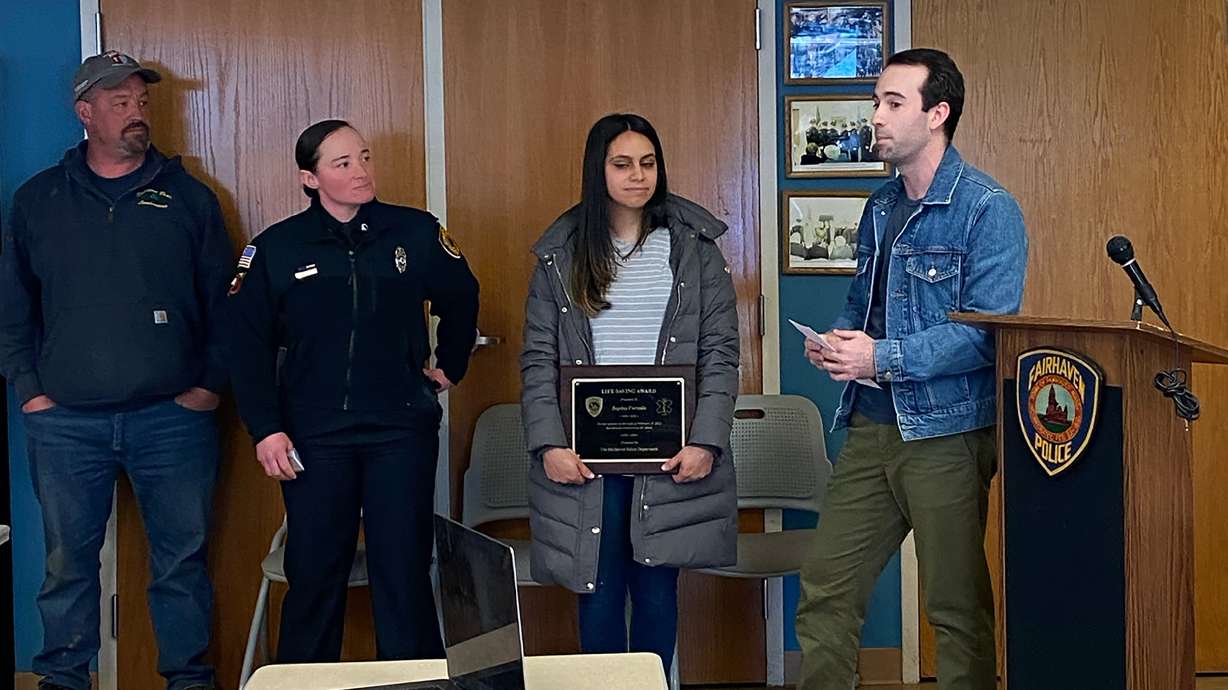Sophia Furtado (second from right) is honored by the Fairhaven Police Department and Doordash, April 27, for her on-the-spot medical care of a woman who ordered a pizza.