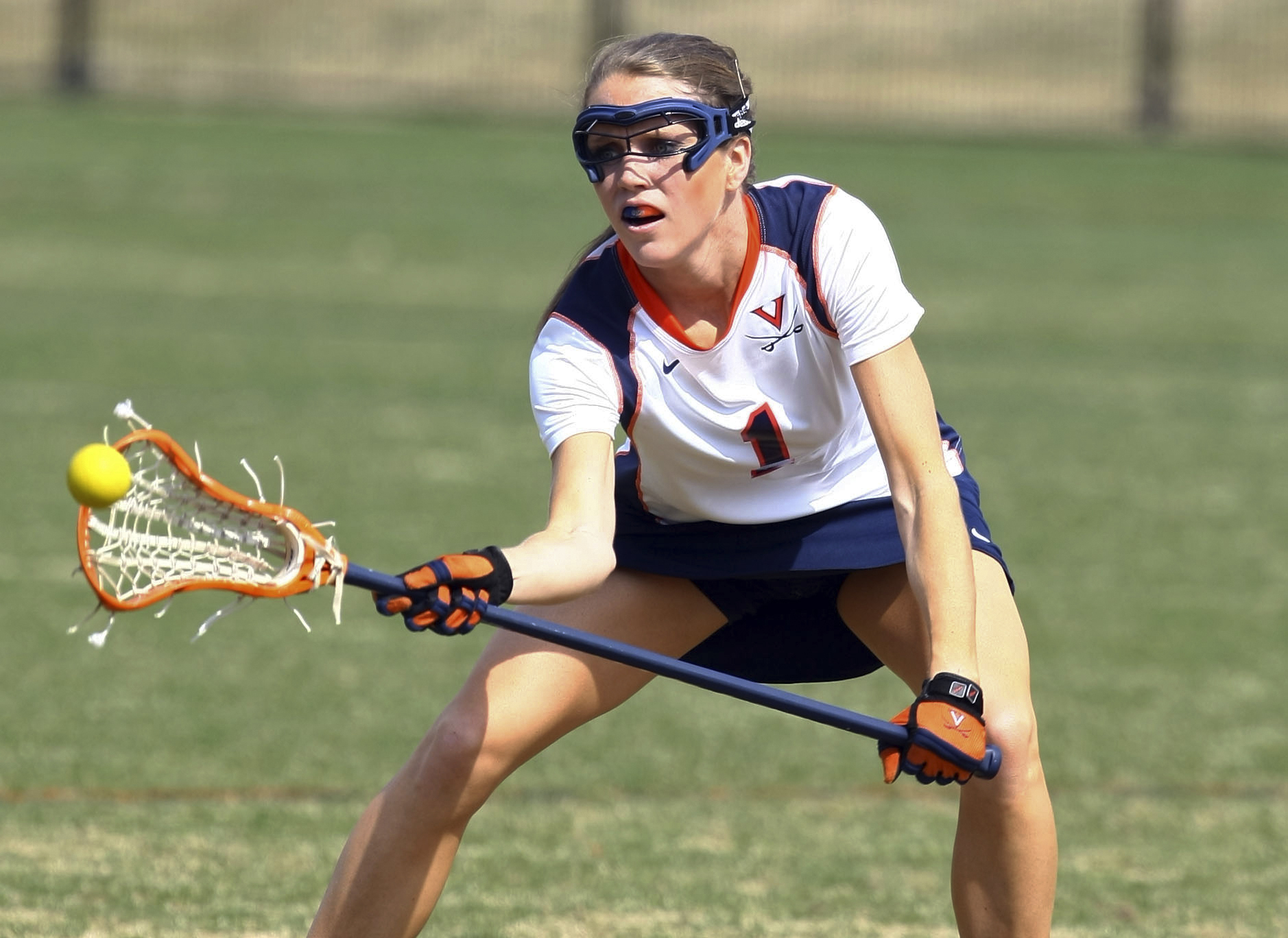 FILE - In a March 8, 2009, photo, University of Virginia women?s lacrosse player Yeardley Love works with the ball in Charlottesville, Va.   Nearly 12 years after Love was found dead, George Huguely, convicted of second-degree murder in her killing is headed back to court for a civil trial. Jury selection is expected in Charlottesville Circuit Court Monday, April 25, 2022 in a trial that will seek to hold George Huguely V liable in the death of Love.  