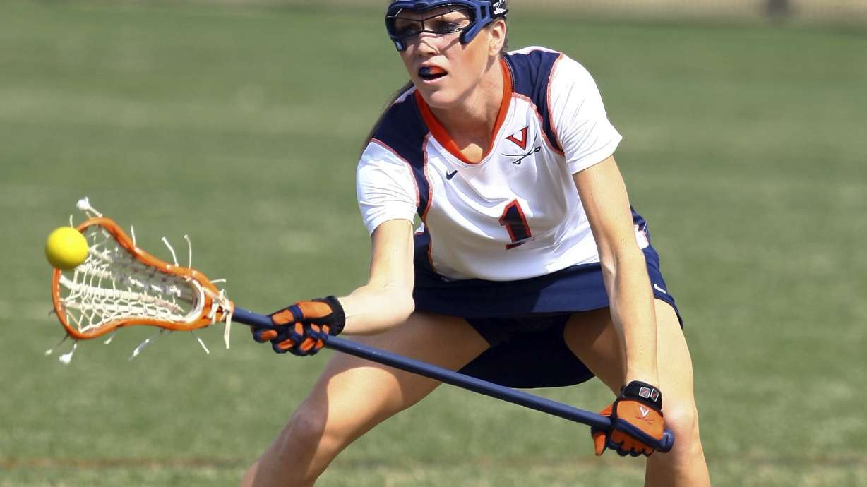 FILE - In a March 8, 2009, photo, University of Virginia women?s lacrosse player Yeardley Love works with the ball in Charlottesville, Va. Nearly 12 years after Love was found dead, George Huguely, convicted of second-degree murder in her killing is headed back to court for a civil trial. Jury selection is expected in Charlottesville Circuit Court Monday, April 25, 2022 in a trial that will seek to hold George Huguely V liable in the death of Love.