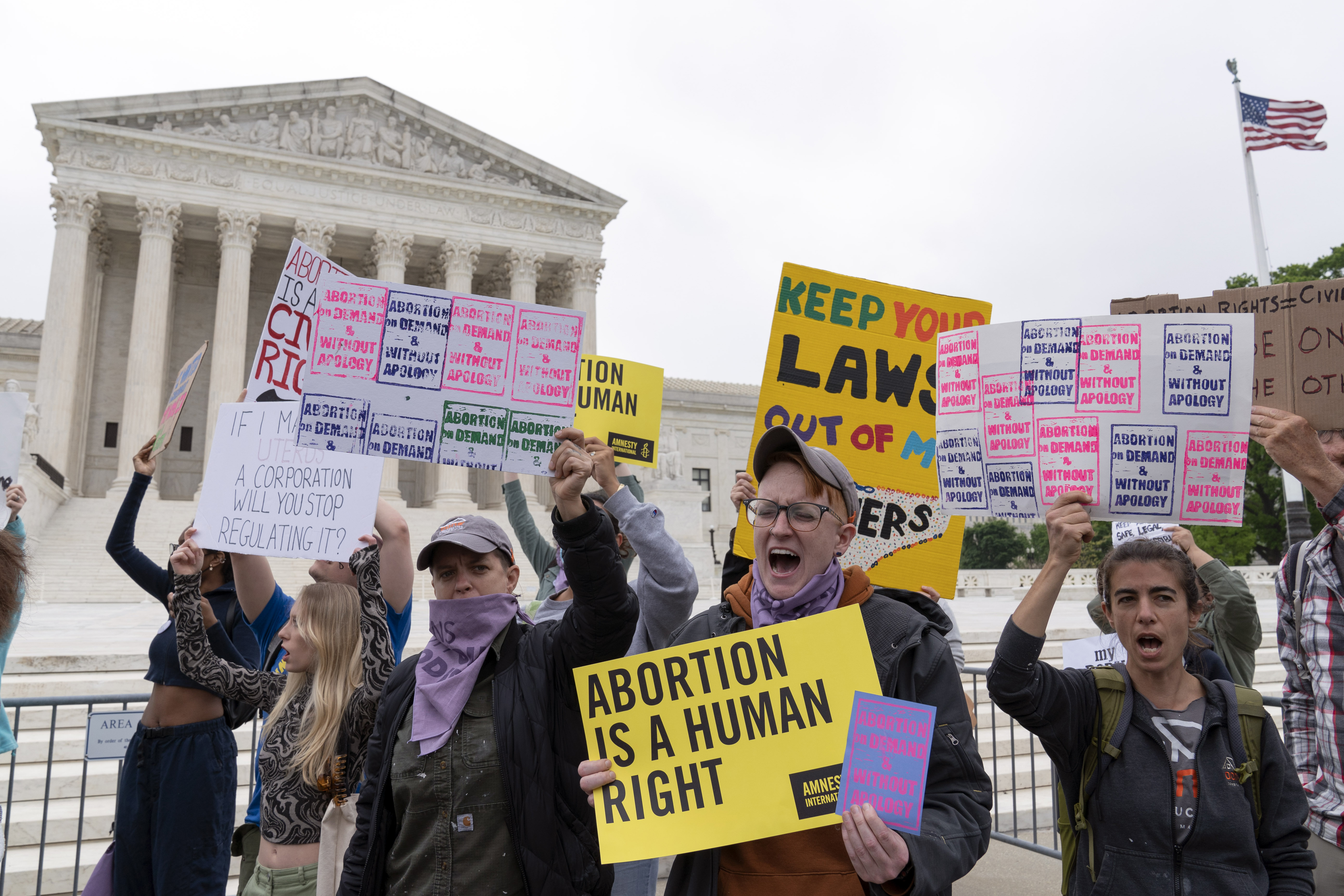 Demonstrators protest outside of the U.S. Supreme Court Tuesday, May 3, 2022 in Washington. A draft opinion suggests the U.S. Supreme Court could be poised to overturn the landmark 1973 Roe v. Wade case that legalized abortion nationwide, according to a Politico report released Monday. Whatever the outcome, the Politico report represents an extremely rare breach of the court's secretive deliberation process, and on a case of surpassing importance. 