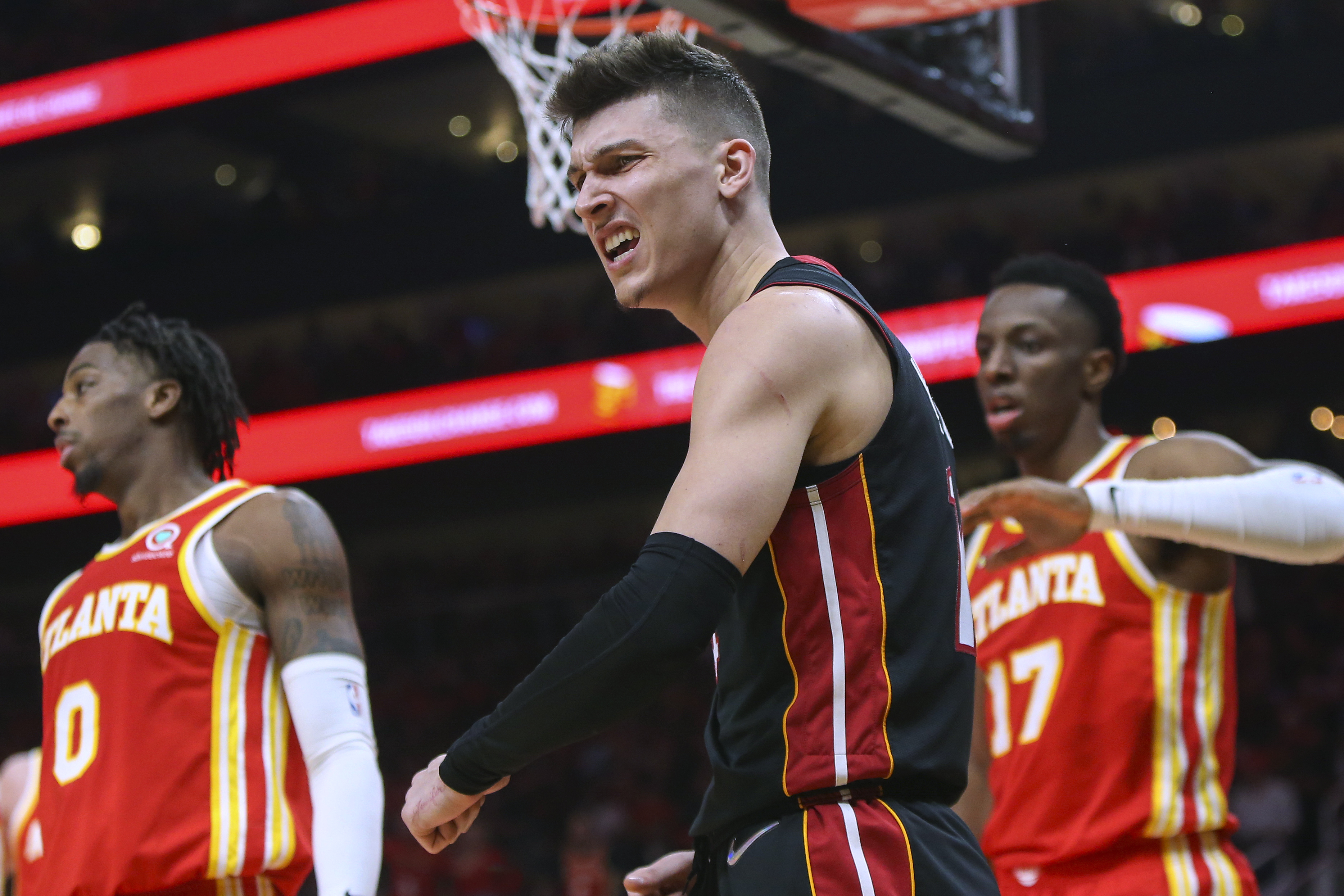 Miami Heat guard Tyler Herro celebrates after a basket during the second half of Game 3 of the team's NBA basketball first-round playoff series against the Atlanta Hawks, Friday, April 22, 2022, in Atlanta. 
