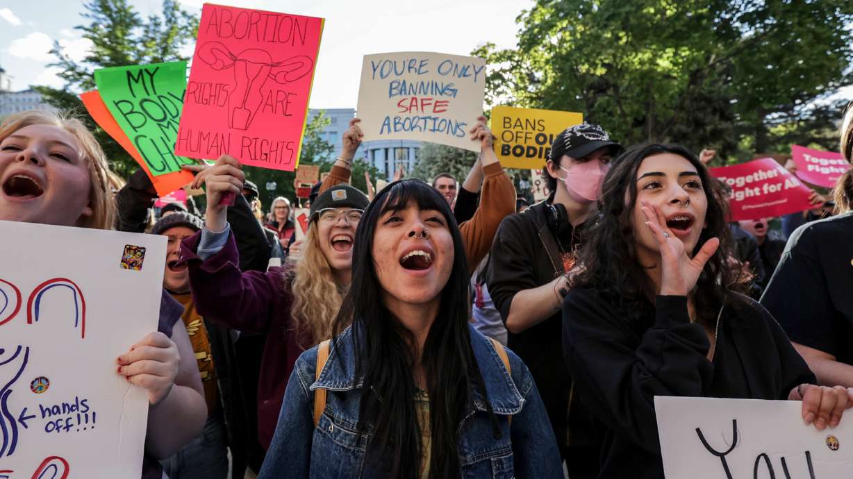 Protesters chant during a rally for abortion rights at Washington Park in Salt Lake City on Tuesday.