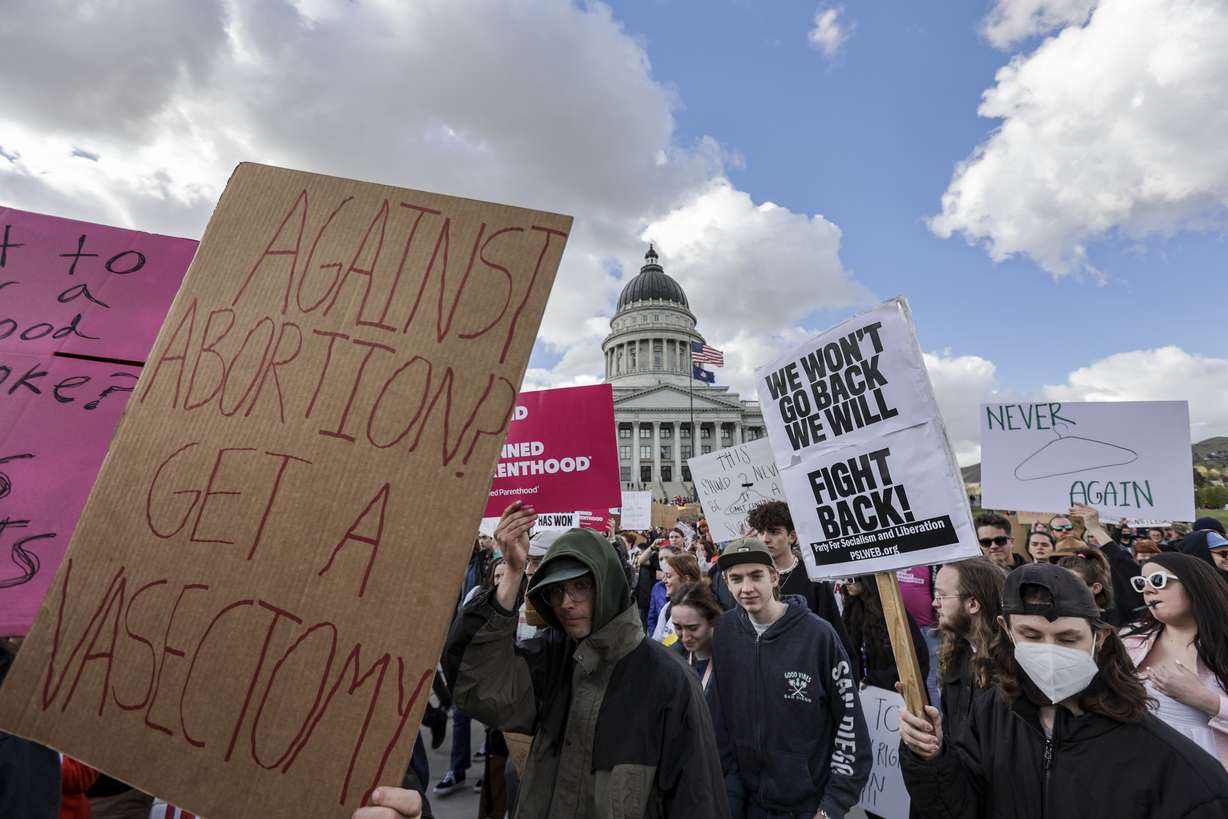 Hundreds of protesters march from the Utah State Capitol to Washington Park in Salt Lake City in support of abortion rights on Tuesday.