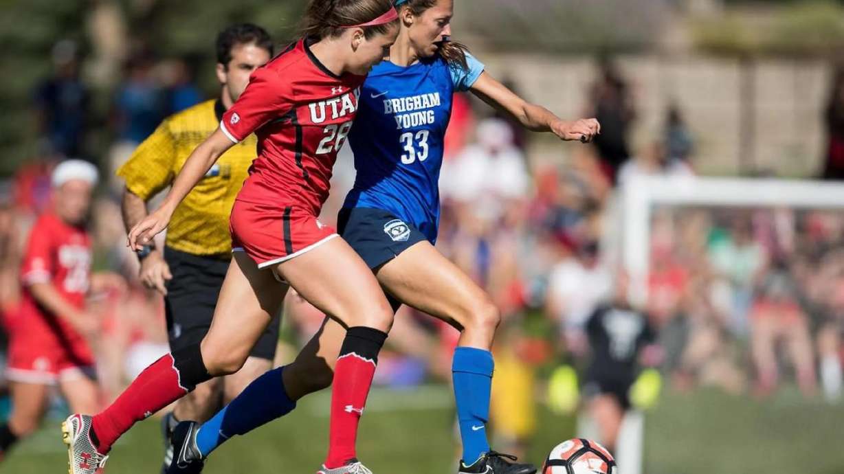 BYU’s Ashley Hatch advances the ball during a game against Utah. The former BYU All-American finished her college playing career in 2016, but recently obtained her degree in family studies