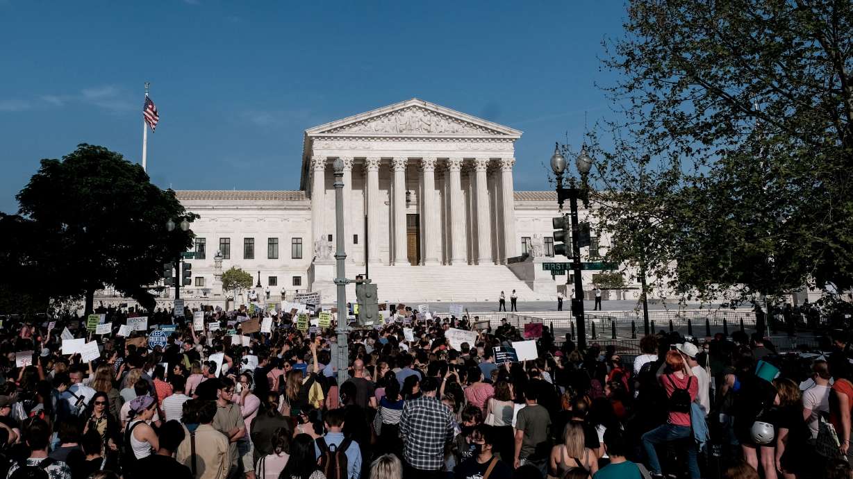 Abortion-rights demonstrators protest outside the U.S. Supreme Court after the leak of a draft majority opinion written by Justice Samuel Alito preparing for a majority of the court to overturn the landmark Roe v. Wade abortion rights decision later this year, in Washington, Tuesday.