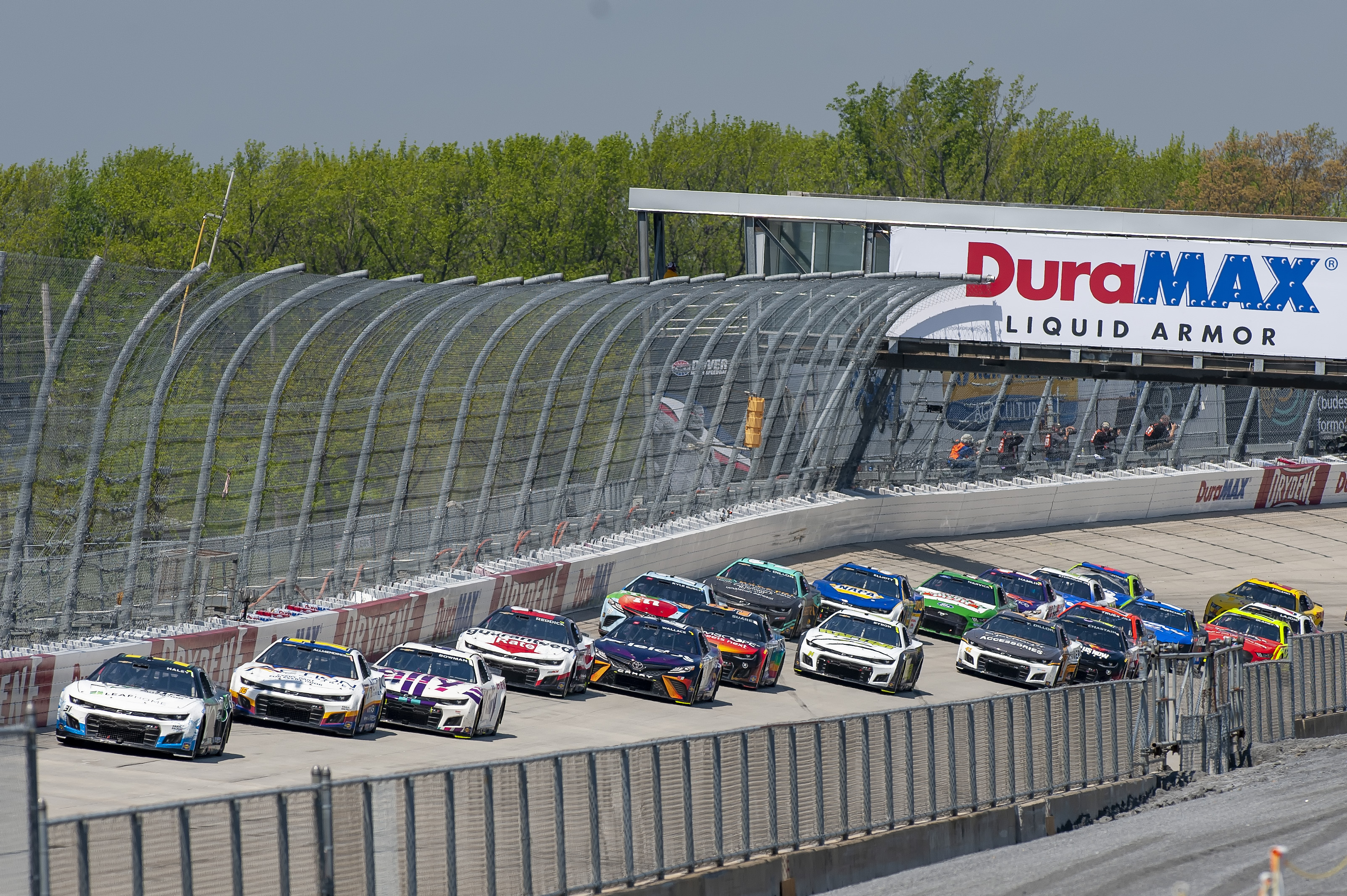 Justin Haley (31) leads going into the back straightaway during a NASCAR Cup Series auto race at Dover Motor Speedway, Monday, May 2, 2022, in Dover, Del. 
