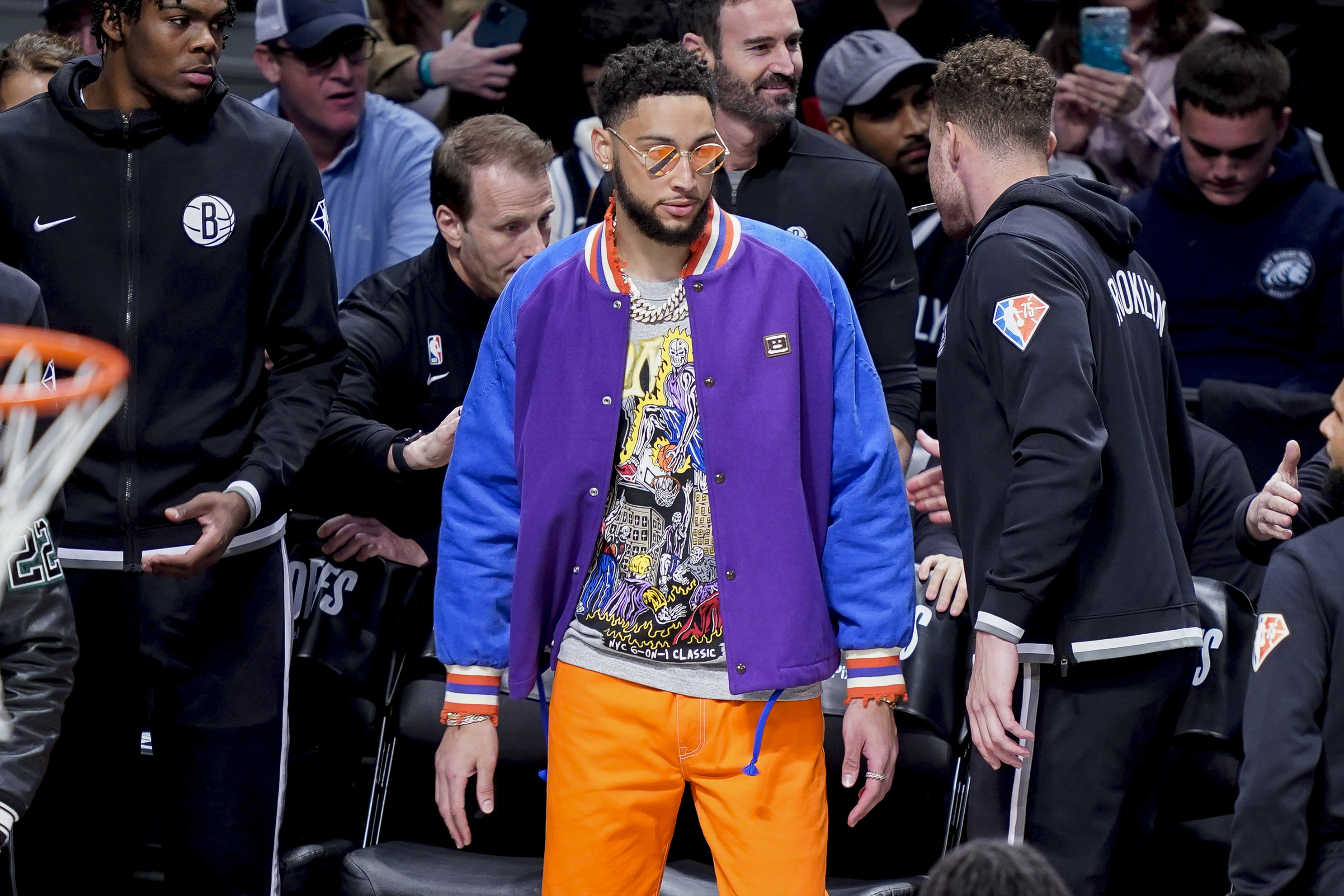 Brooklyn Nets' Ben Simmons stands by the bench during the first half of Game 3 of an NBA basketball first-round playoff series against the Boston Celtics, Saturday, April 23, 2022, in New York.