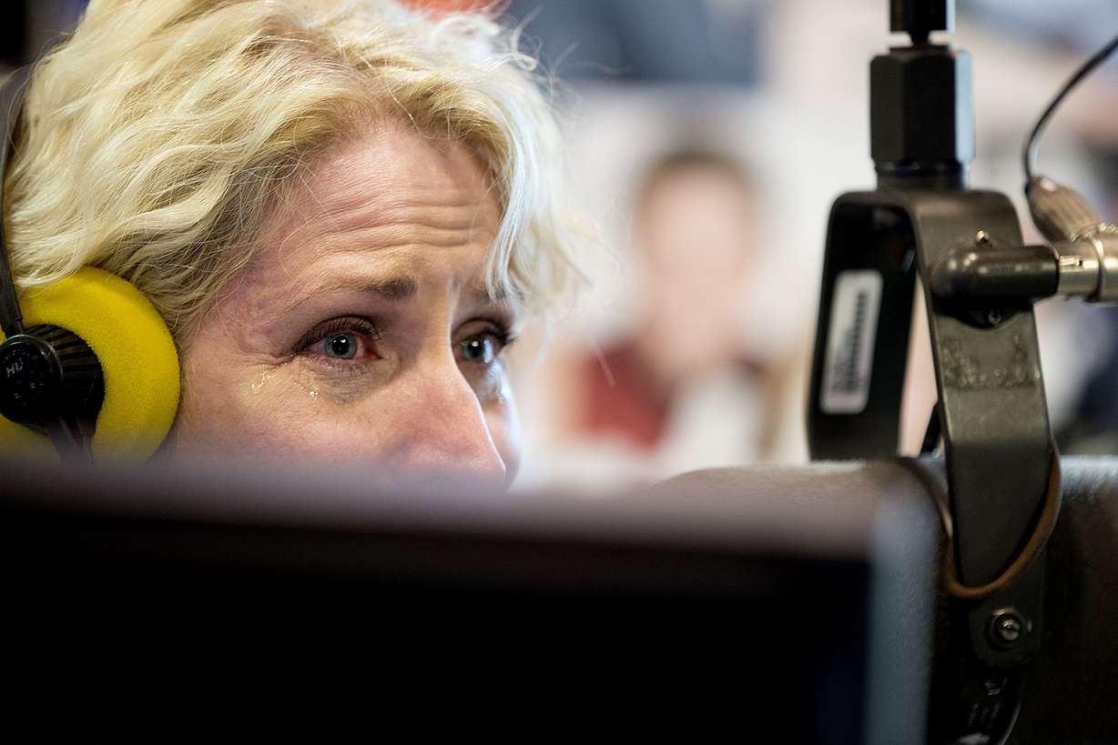 Co-host of “Utah’s Morning News” Amanda Dickson gets emotional on Grant Nielsen’s last day at KSL Newsradio in Salt Lake City on March 20, 2015.