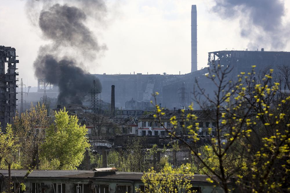 Smoke rises from the Metallurgical Combine Azovstal in Mariupol, in territory under the government of the Donetsk People's Republic, eastern Ukraine, Wednesday. Heavy fighting is raging at the besieged steel plant in Mariupol as Russian forces attempt to finish off the city's last-ditch defenders and complete the capture of the strategically vital port.
