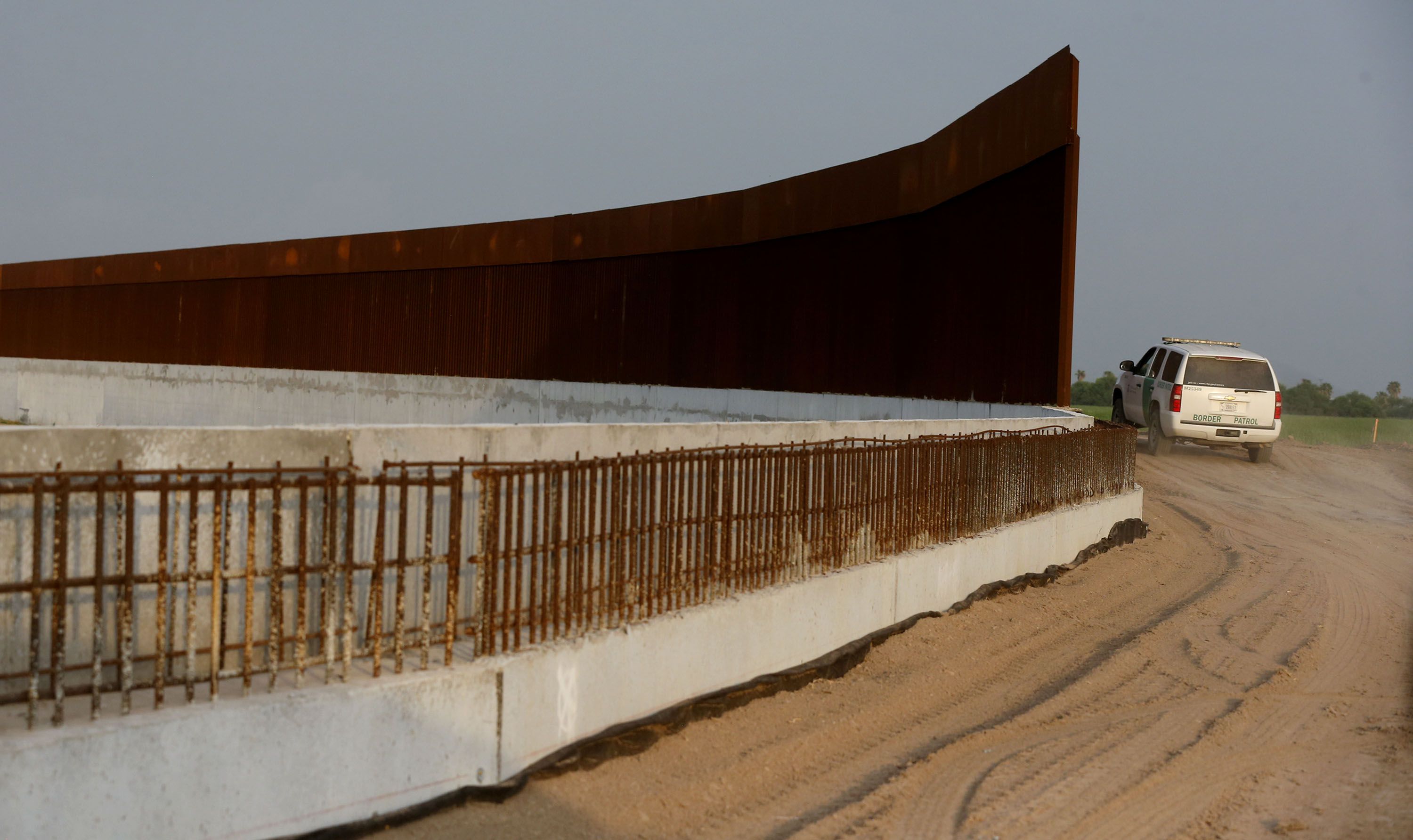 A Border Patrol agent drives along the border wall near McAllen, Texas, on June 22, 2021. Sen. Mitt Romney lambasted Homeland Security Secretary Alejandro Mayorkas — again — for failing to secure the U.S. border with Mexico and suggested it might be time for him to go.