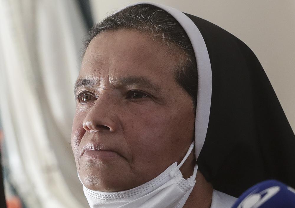 Colombian nun Gloria Cecilia Narvaez, who was held captive for nearly five years by al-Qaida-linked militants, listens to a question during a press conference in Bogota, Colombia, in this Nov. 19, 2021, photo. Pope Francis authorized spending up to 1 million euros to free Narvaez, a cardinal testified Thursday.