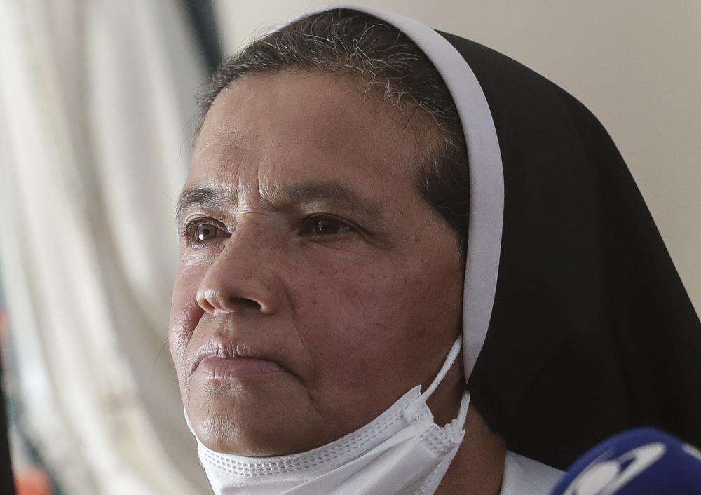 Colombian nun Gloria Cecilia Narvaez, who was held captive for nearly five years by al-Qaida-linked militants, listens to a question during a press conference in Bogota, Colombia, in this Nov. 19, 2021, photo. Pope Francis authorized spending up to 1 million euros to free Narvaez, a cardinal testified Thursday.