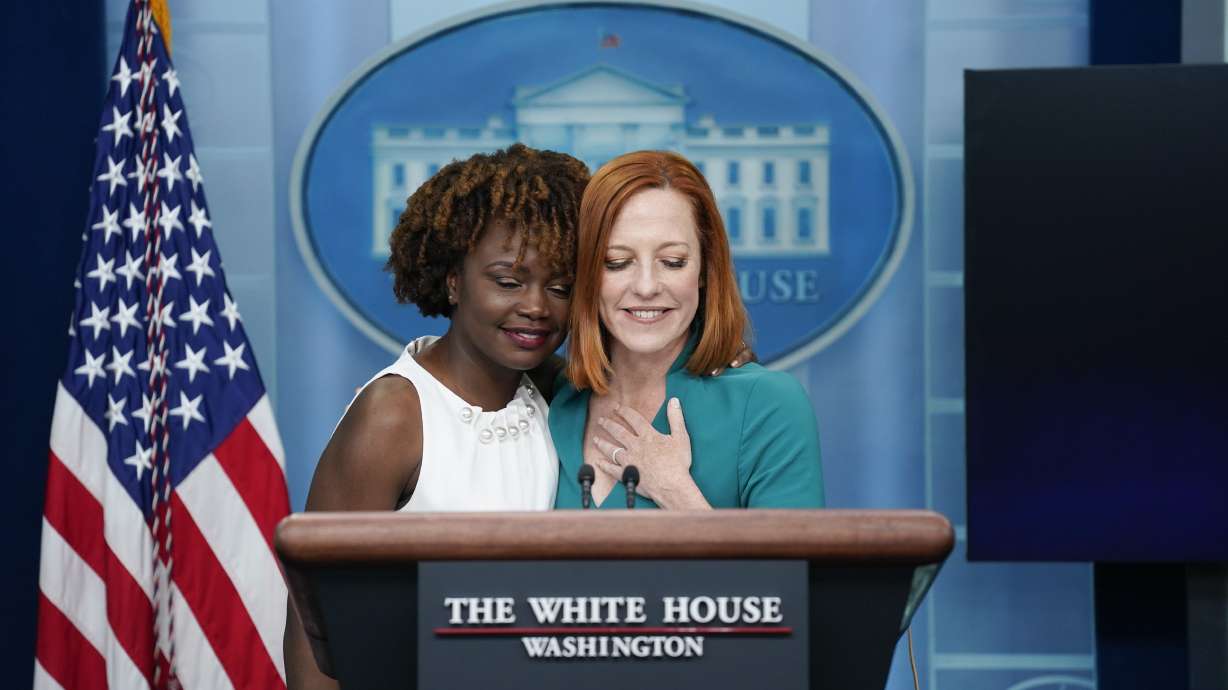White House press secretary Jen Psaki hugs incoming press secretary Karine Jean-Pierre during a press briefing at the White House, Thursday, in Washington.