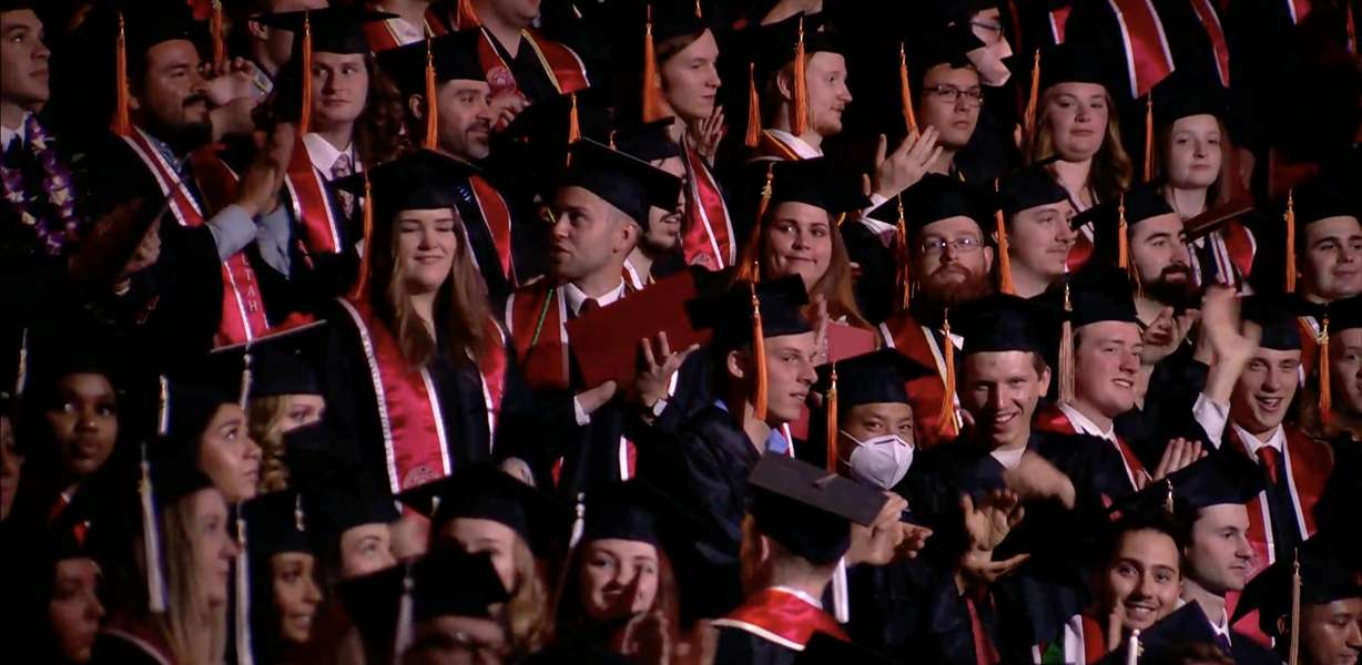 University of Utah students clap during the U.'s commencement ceremony on Thursday at the Jon M. Huntsman Center.