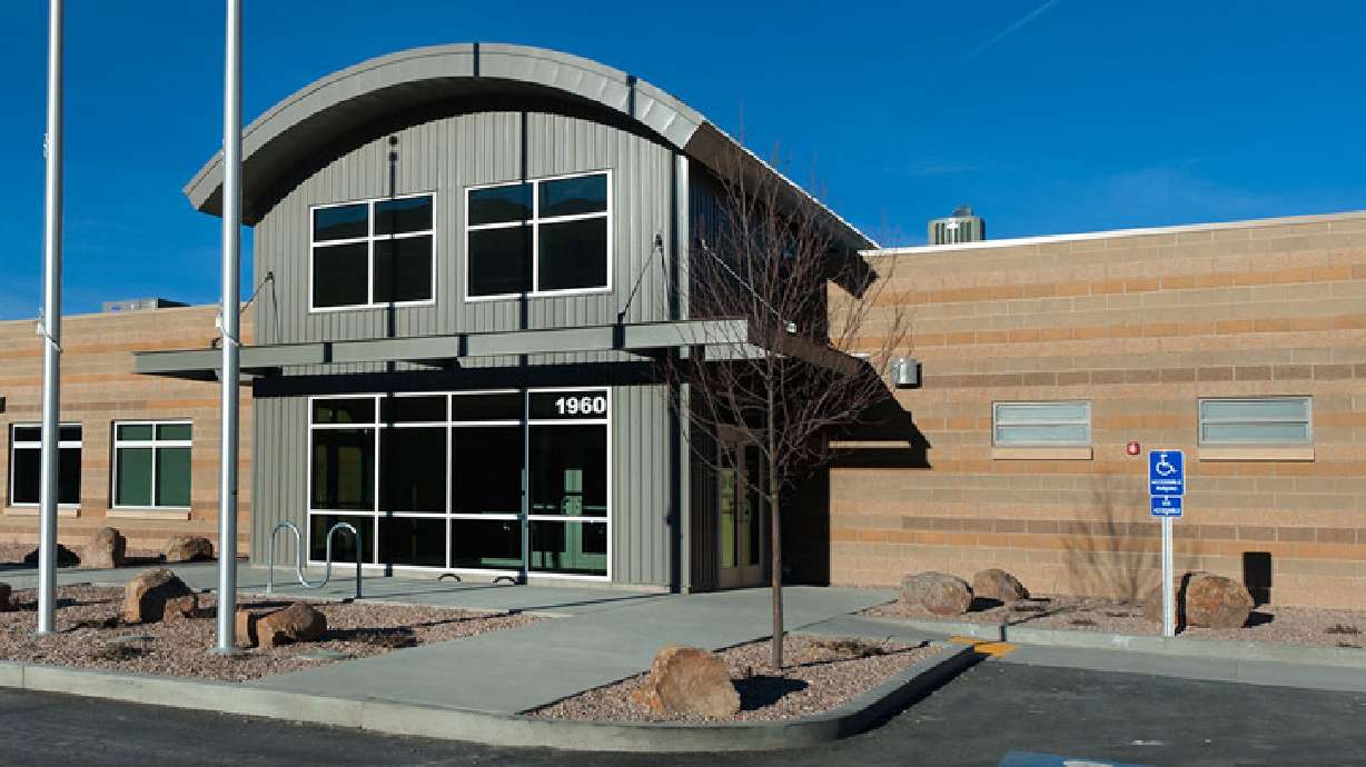 Charges were filed Monday against a Tooele woman accused of putting small boxes on the heads of her two young stepchildren and tying their hands behind their backs for hours at a time.