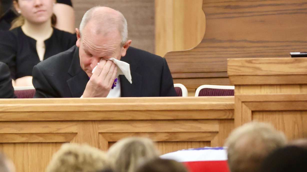 Brent Hatch, son of former U.S. Sen. Orrin Hatch, wipes tears away during his father’s funeral at The Church of Jesus Christ of Latter-day Saints' Institute of Religion adjacent to the University of Utah in Salt Lake City on Friday.