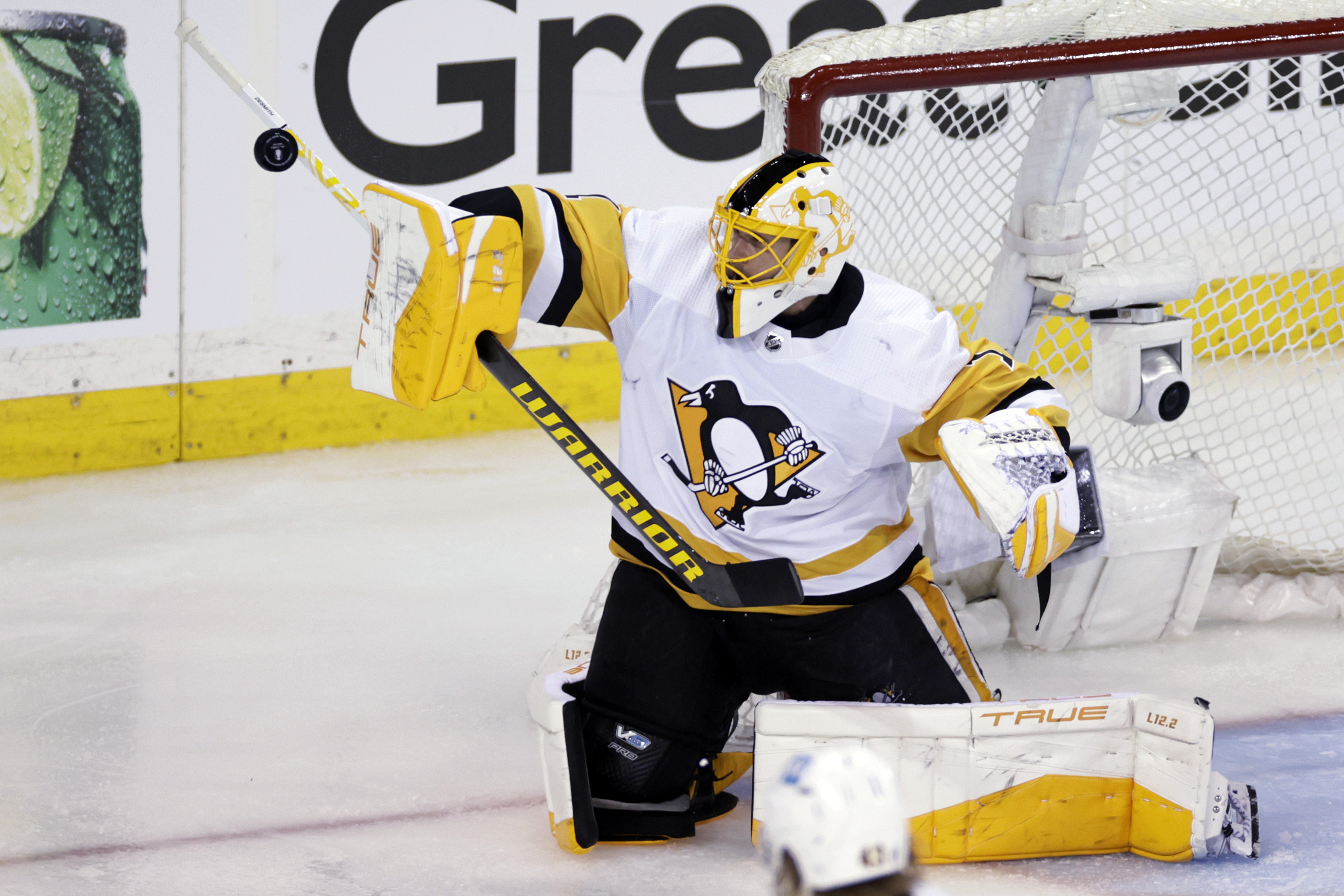 Pittsburgh Penguins goaltender Casey DeSmith makes a save against the New York Rangers in overtime of Game 1 of an NHL hockey Stanley Cup first-round playoff series, Tuesday, May 3, 2022, in New York. 