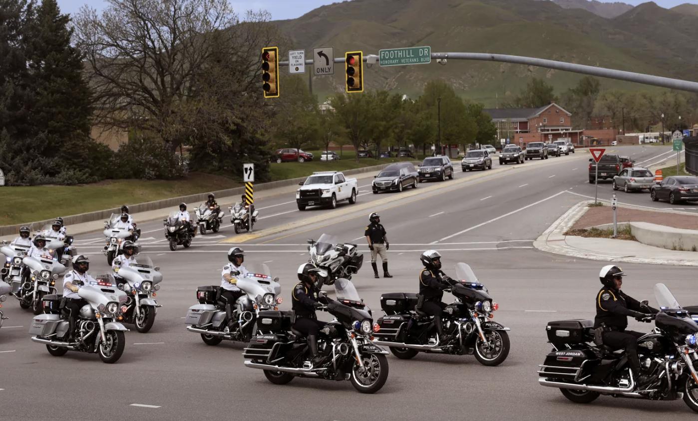 The funeral procession for former U.S. Sen. Orrin G. Hatch moves along Foothill Driver after the funeral service at The Church of Jesus Christ of Latter-day Saints Institute of Religion adjacent to the University of Utah in Salt Lake City on Friday.