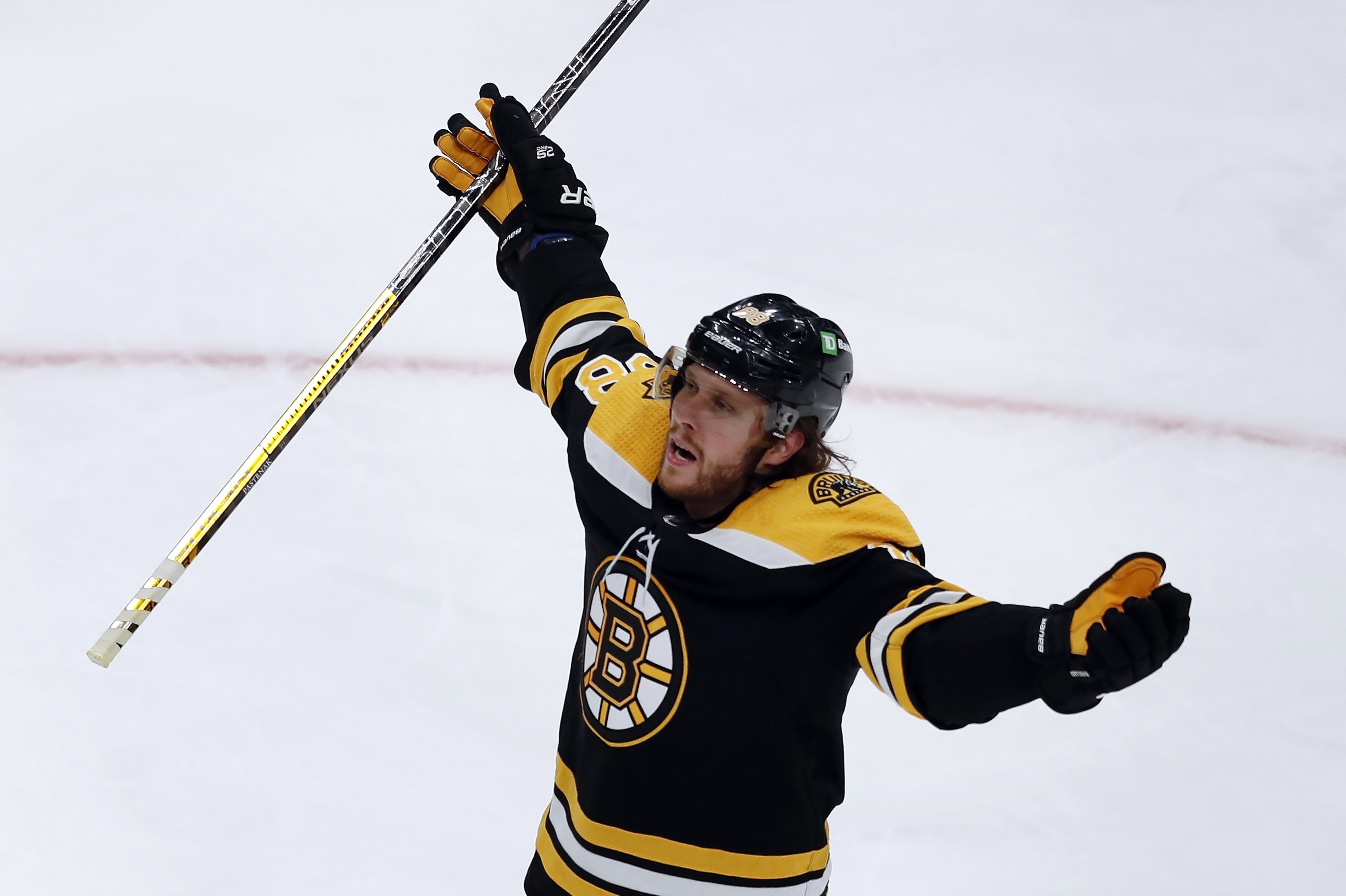 Boston Bruins' David Pastrnak celebrates his goal during the second period of Game 3 of an NHL hockey Stanley Cup first-round playoff series against the Carolina Hurricanes, Friday, May 6, 2022, in Boston. 