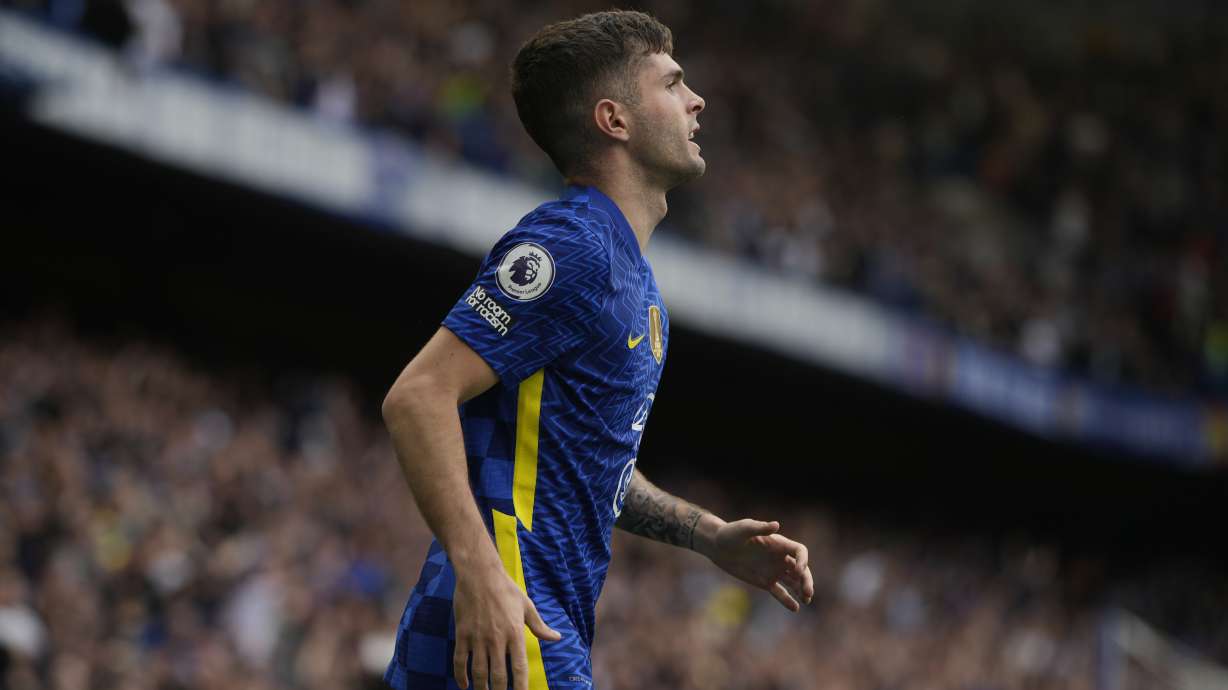 Chelsea's Christian Pulisic celebrates after scoring the only goal of the game during the English Premier League soccer match between Chelsea and West Ham United at Stamford Bridge in London, Sunday, April 24, 2022. Chelsea won the match 1-0.