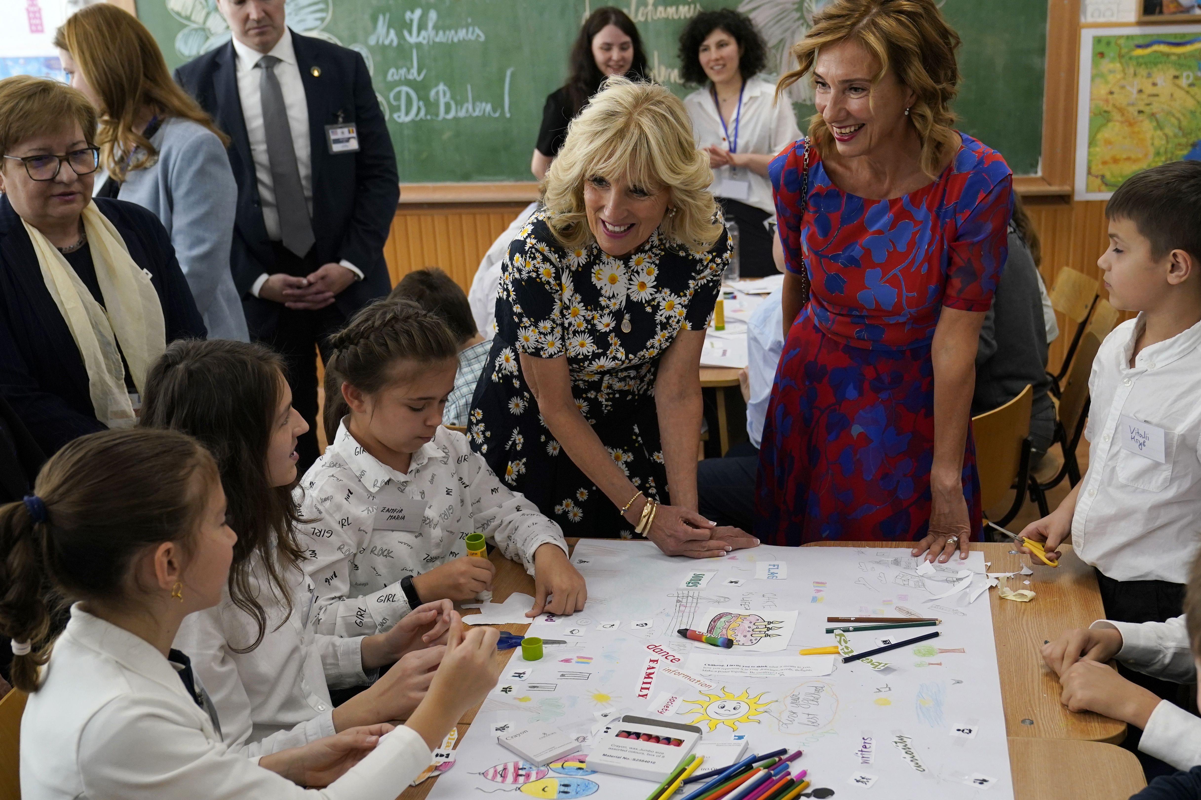 First lady Jill Biden and first lady of Romania Carmen Iohannis visit the coala Gimnaziala Uruguay, or Uruguay School, in Bucharest Romania, Saturday. Biden visited several classrooms to visit with children and the educators who are helping teach displaced Ukrainian children.