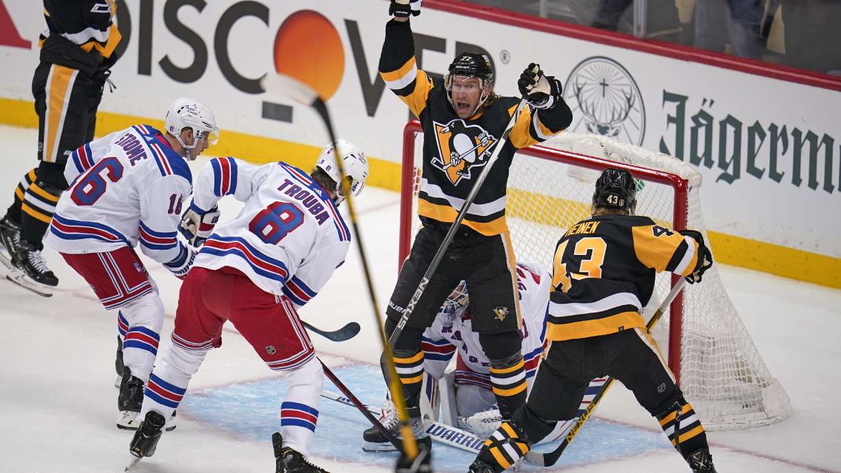Pittsburgh Penguins' Jeff Carter (77) celebrates his goal in the first period in Game 3 of an NHL hockey Stanley Cup first-round playoff series against the New York Rangers in Pittsburgh, Saturday, May 7, 2022.