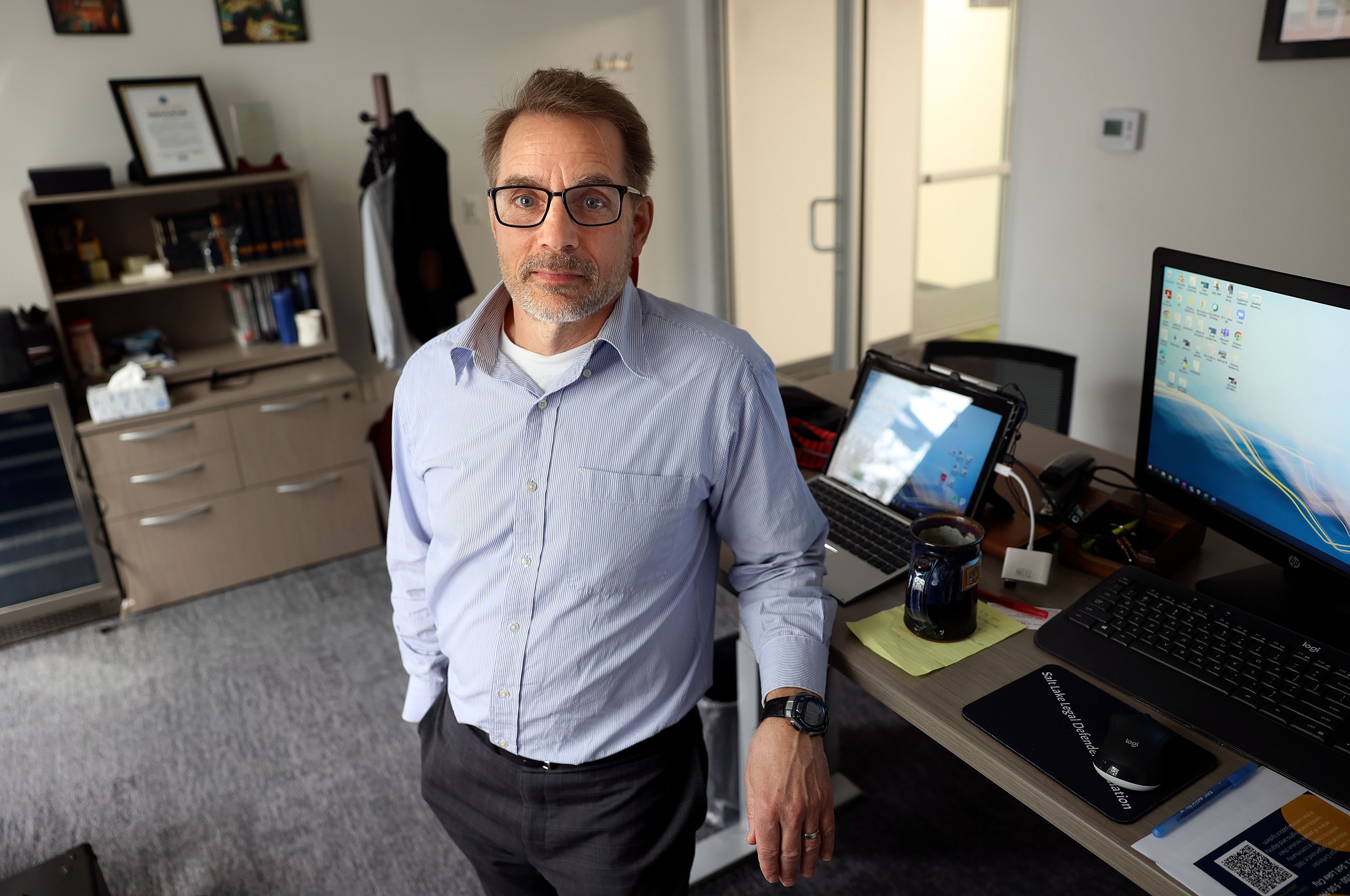Rich Mauro, Salt Lake Legal Defender Association’s executive director, poses for a portrait at his office in Salt Lake City on April 28. The justice system in Utah is straining under the weight of an immense backlog of criminal cases, especially serious felony cases, leaving many defendants to languish in custody as additional filings continue to accumulate.