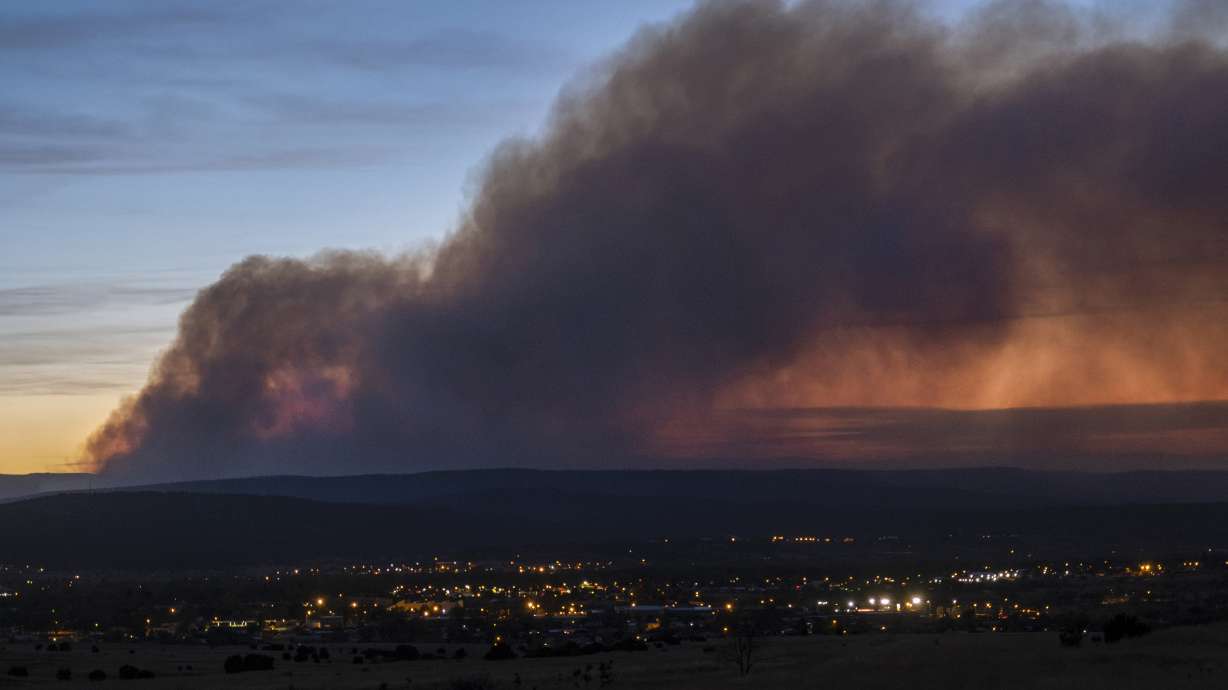 Smoke from the Calf Canyon/Hermits Peak Fire drifts over Las Vegas, N.M., on Saturday.