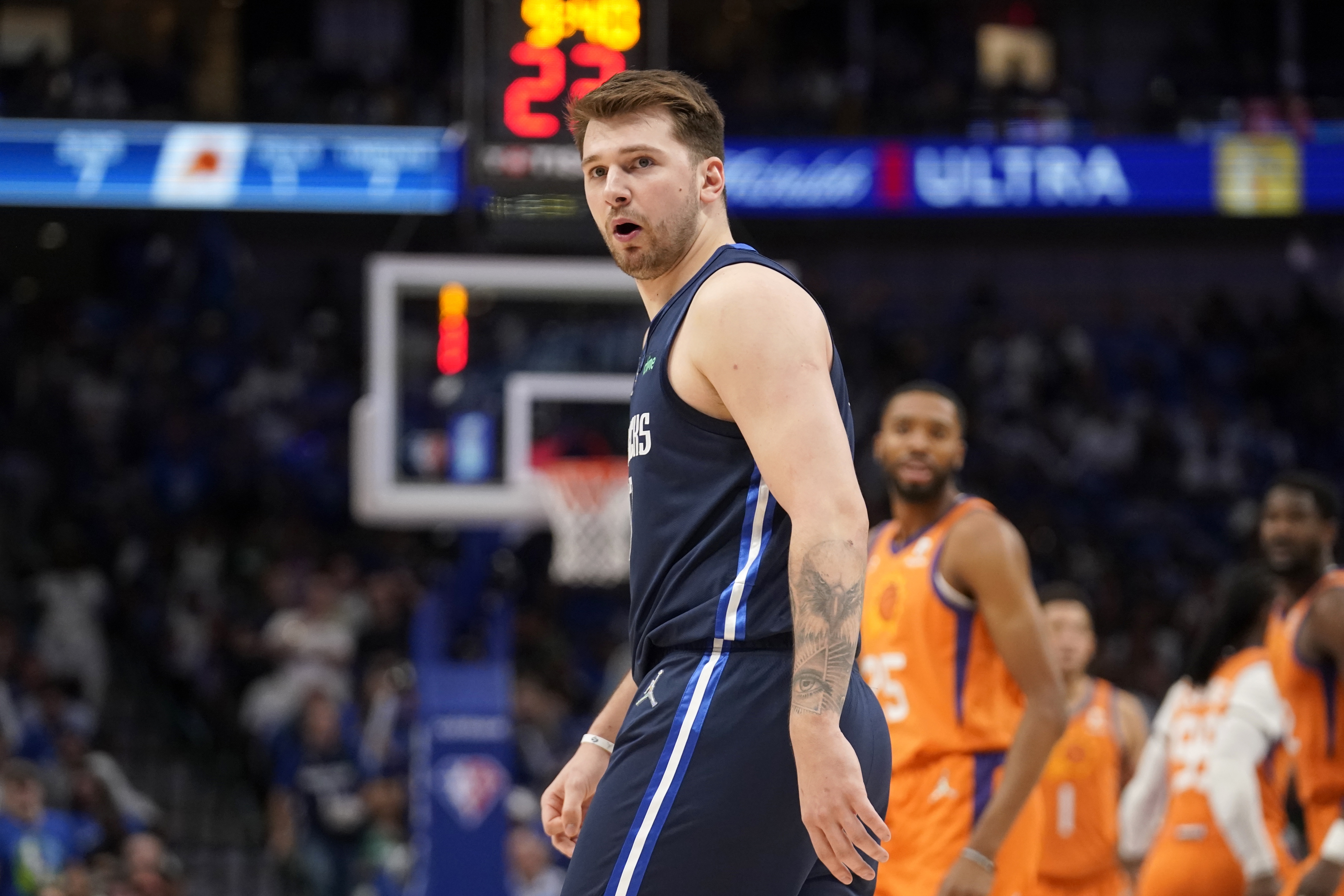 Dallas Mavericks guard Luka Doncic shouts at an official standing nearby in the first half of Game 4 of an NBA basketball second-round playoff series, Sunday, May 8, 2022, in Dallas. 
