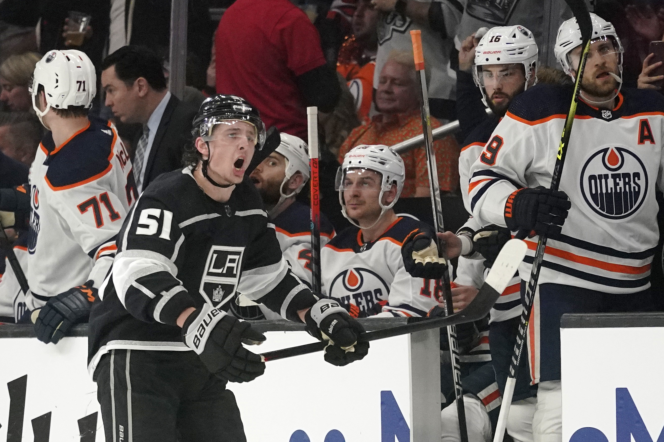 Los Angeles Kings defenseman Troy Stecher celebrates in front of the Edmonton Oilers' bench after scoring during the first period in Game 4 of an NHL hockey Stanley Cup first-round playoff series Sunday, May 8, 2022, in Los Angeles. 
