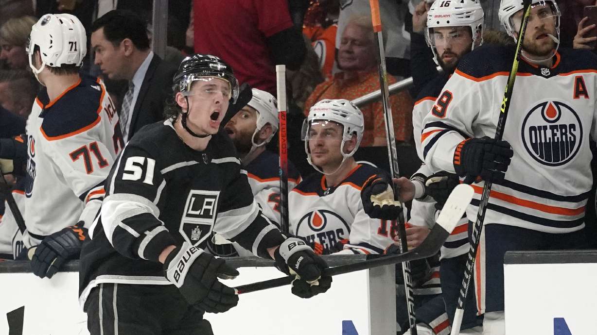 Los Angeles Kings defenseman Troy Stecher celebrates in front of the Edmonton Oilers' bench after scoring during the first period in Game 4 of an NHL hockey Stanley Cup first-round playoff series Sunday, May 8, 2022, in Los Angeles.
