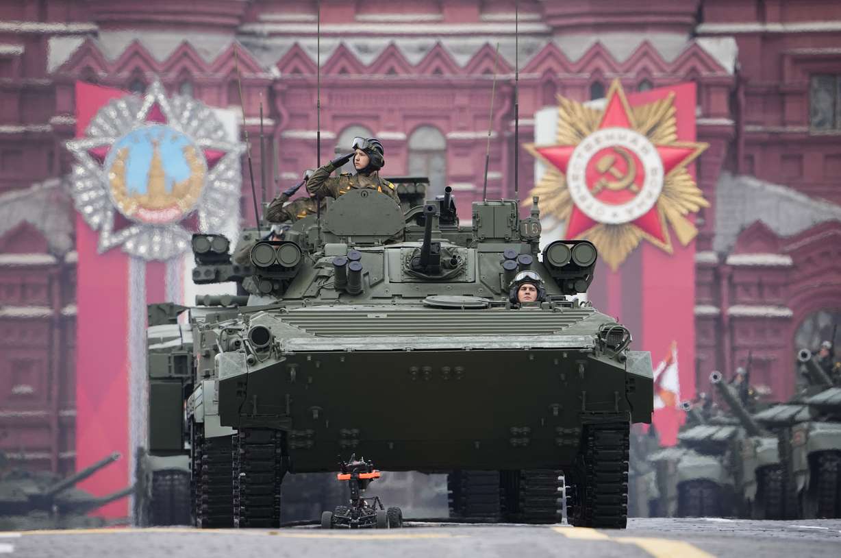 Russian military vehicles roll during the Victory Day military parade in Moscow, Russia, Monday, marking the 77th anniversary of the end of World War II.