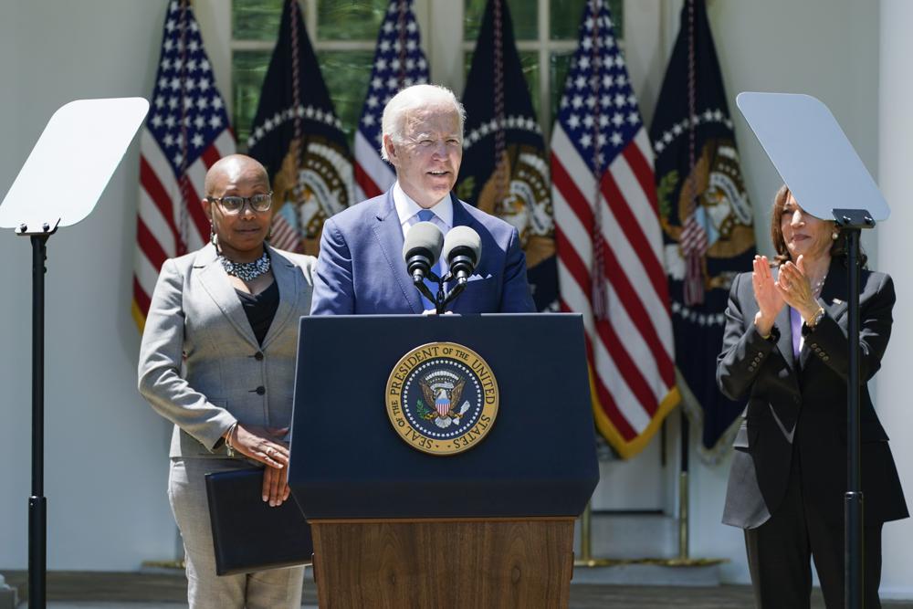 Vice President Kamala Harris applauds as President Joe Biden speaks at an event on lowering the cost of high-speed internet in the Rose Garden of the White House, Monday in Washington.

