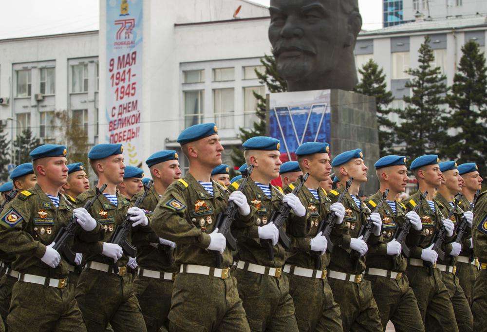 Russian servicemen march during the Victory Day military parade in Ulan-Ude, the regional capital of Buryatia, a region near the Russia-Mongolia border, Russia, Monday, marking the 77th anniversary of the end of World War II. Russian President Vladimir Putin marked his country's biggest patriotic holiday Monday without a major new battlefield success in Ukraine.