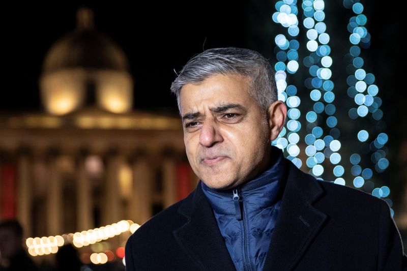 FILE PHOTO: Mayor of London, Sadiq Khan looks on during an interview after Trafalgar Square Christmas Tree Lighting ceremony at Trafalgar Square, London, Britain, December 2, 2021.