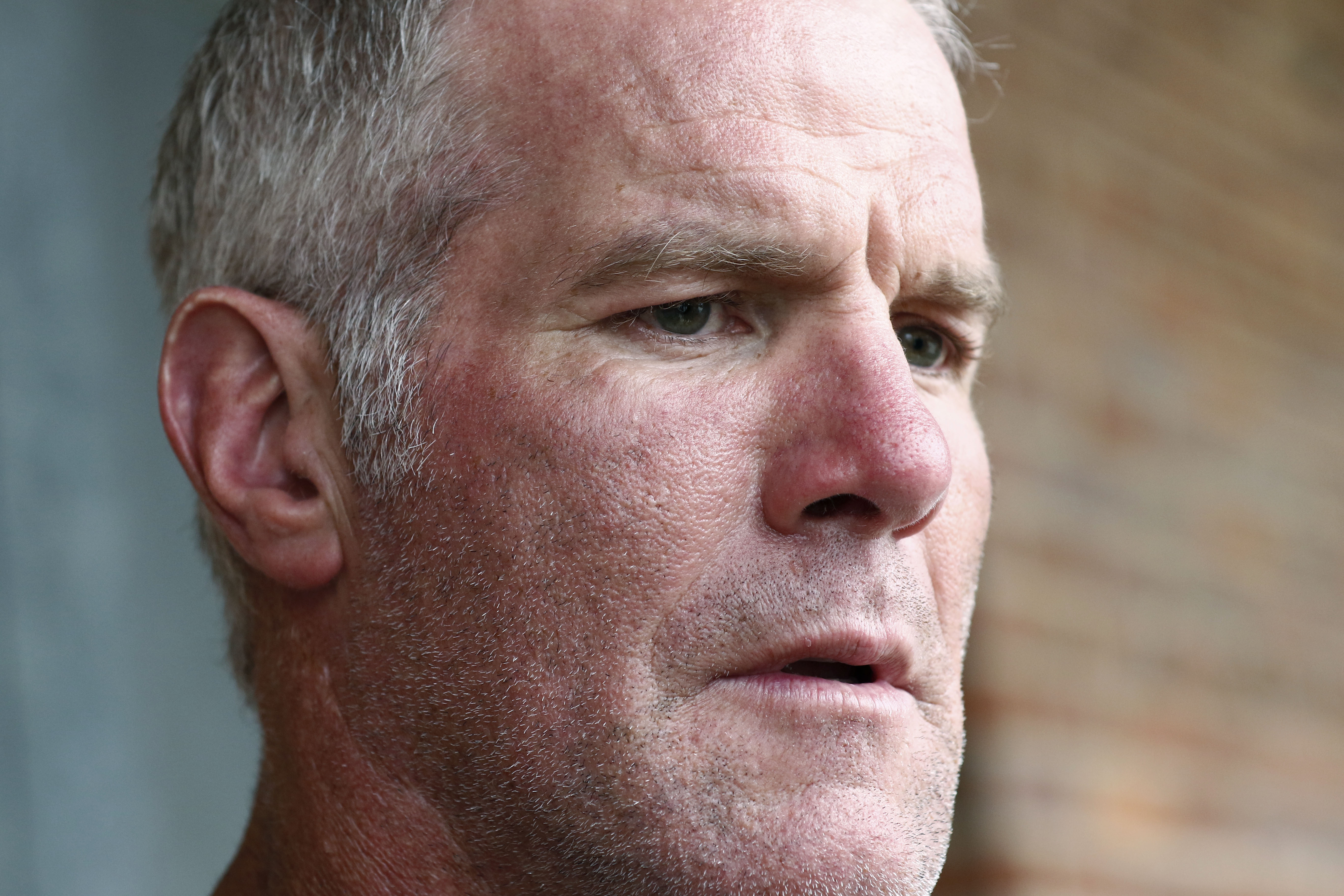 FILE - Former NFL quarterback Brett Favre speaks to the media in Jackson, Miss., Oct. 17, 2018. On Monday, May 9, 2022, the Mississippi Department of Human Services sued Favre, three former pro wrestlers and several other people and businesses to try to recover millions of misspent welfare dollars that were intended to help some of the poorest people in the U.S. 