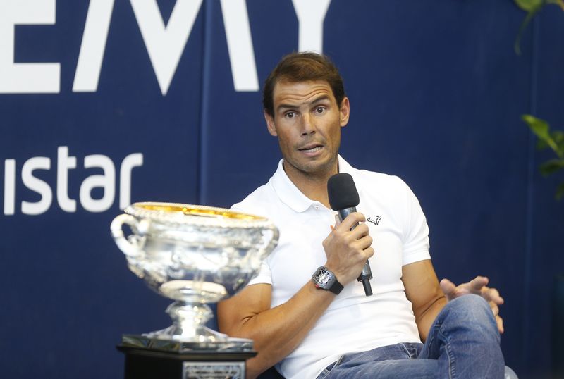 FILE PHOTO: Tennis - Rafael Nadal Press Conference - Rafa Nadal Academy, Mallorca, Spain - February 2, 2022 Spain's Rafael Nadal with the Australian Open trophy during the press conference