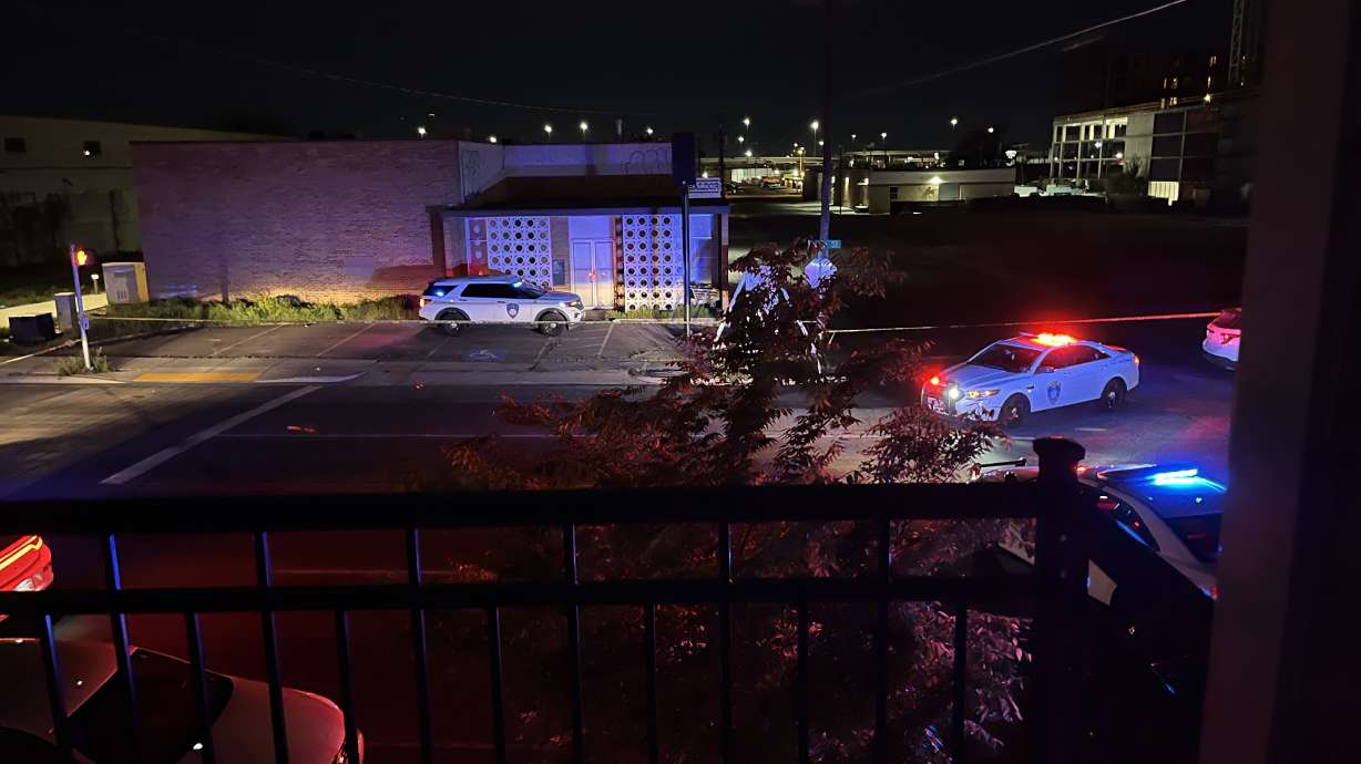 Police investigate a fatal shooting near the parking lot of a South Salt Lake WinCo store, 2193 S. Main, on Tuesday, May 10, 2022.