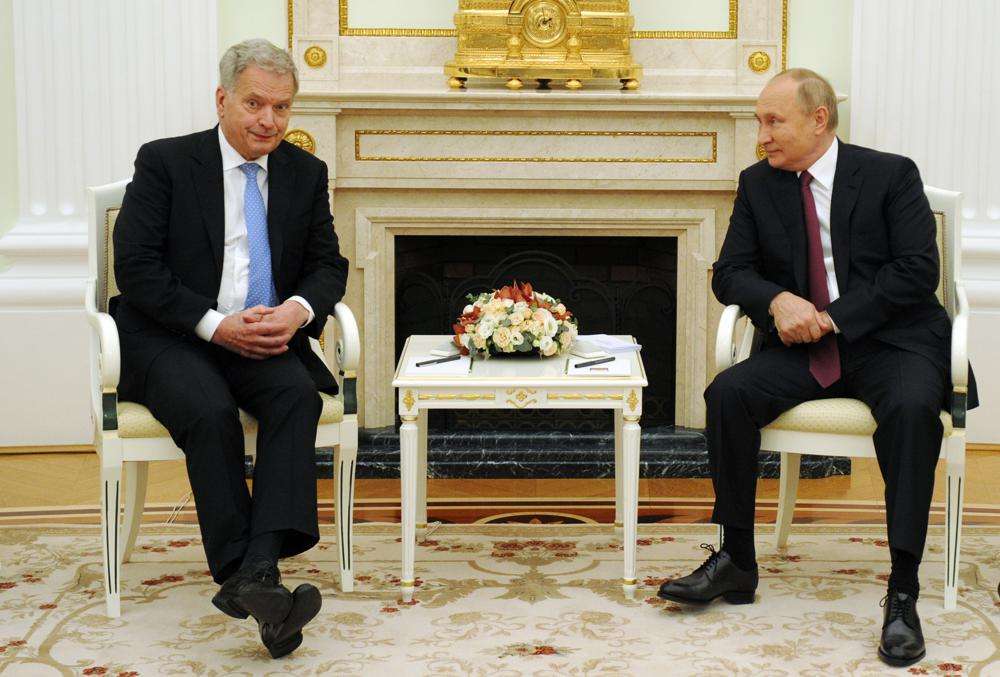 Russian President Vladimir Putin, right, and Finnish President Sauli Niinisto talk during their meeting in the Kremlin in Moscow, Russia, Oct. 29, 2021. Niinisto, the Western leader who appeared to have the best rapport with Putin before the Ukraine war, is expected to announce his stance on NATO membership on Thursday.