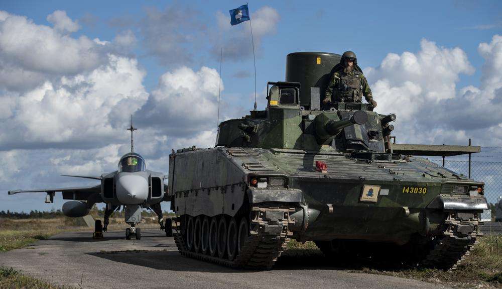 Swedish troops prepare in the Baltic Sea region, Aug. 25, 2020. The question of whether to join NATO is coming to a head in Finland and Sweden, where Russia’s invasion of Ukraine has shattered the long-held belief that remaining outside the military alliance was the best way to avoid trouble with their giant neighbor.
