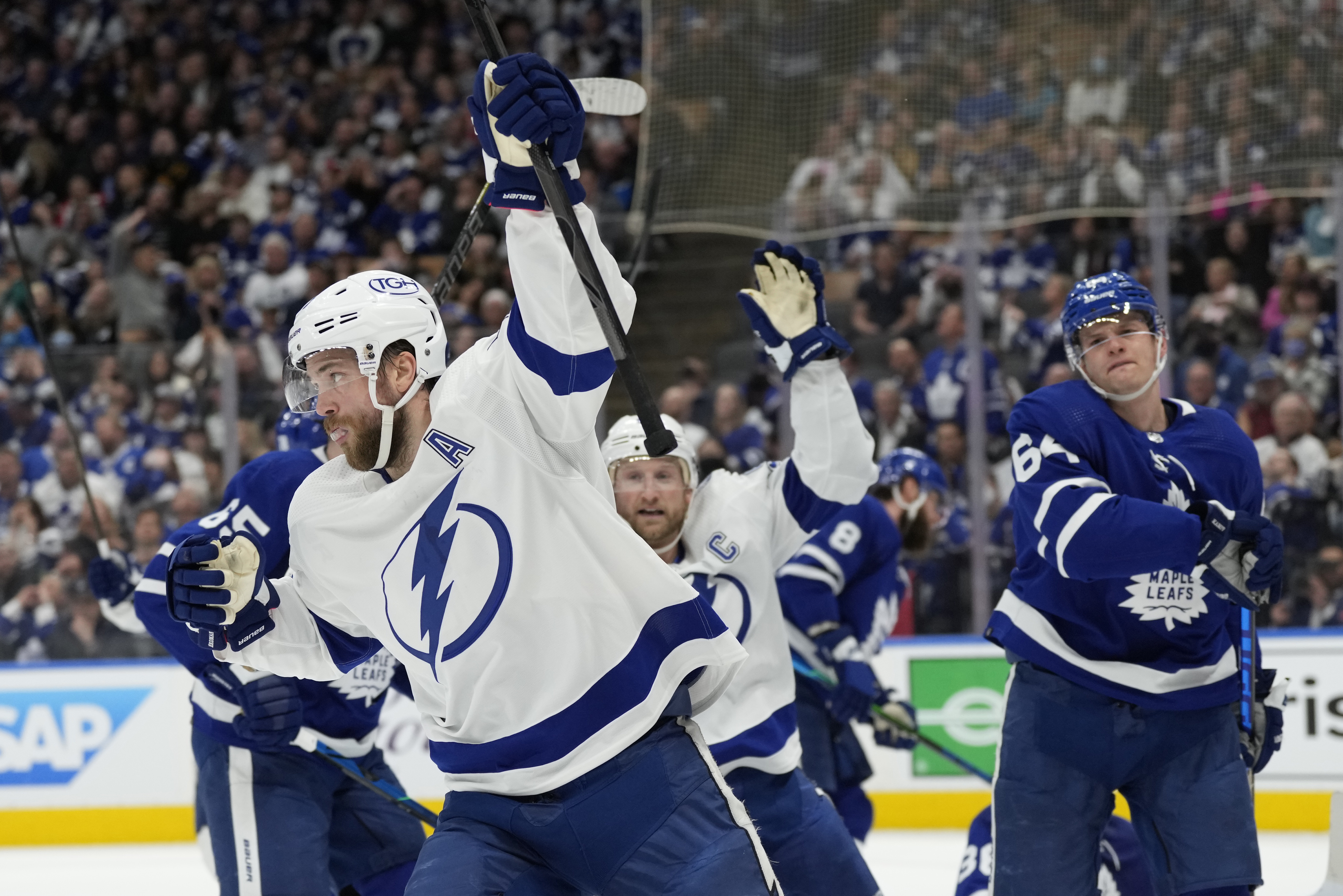 Tampa Bay Lightning defenseman Victor Hedman (77) celebrates his goal against the Toronto Maple Leafs with center Steven Stamkos (91) during the first period of Game 2 of an NHL hockey Stanley Cup playoffs first-round series Wednesday, May 4, 2022, in Toronto. 