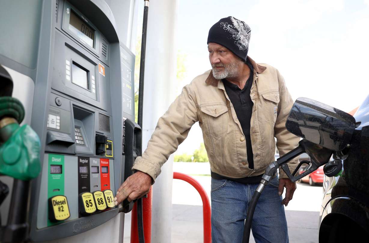 Charles Barnes fuels up at Shoppers Express in Salt Lake City on Tuesday, May 10, 2022. Gas prices have hit a new record high.